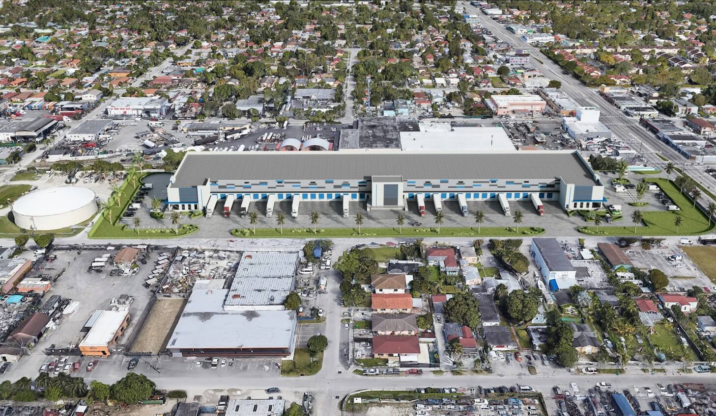 A bird 's eye view of a parking lot and lots of houses.